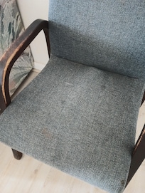 Stained and warped chair