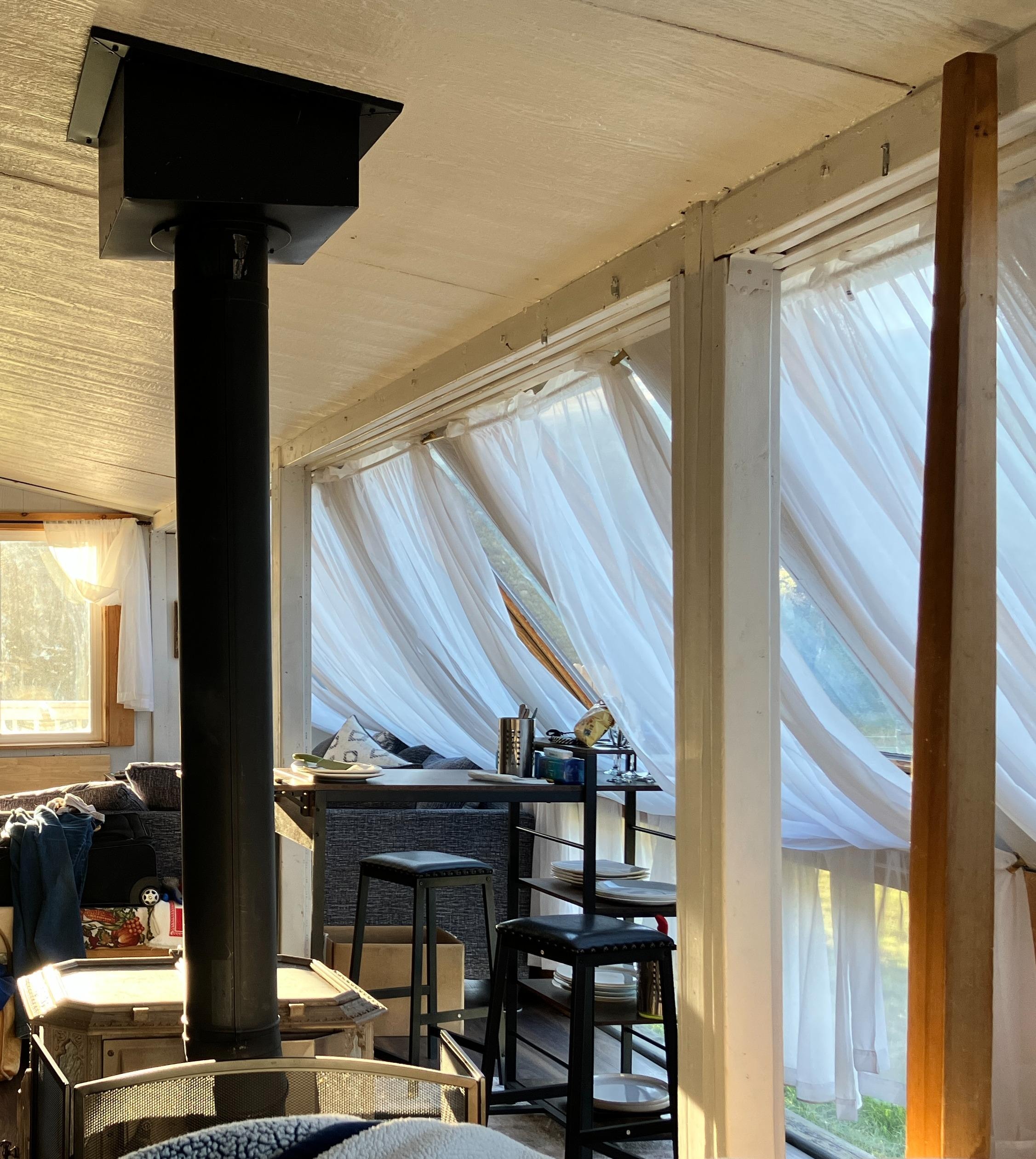 View from the bed...doesn't show the whole room, but I didn't want to show our messy suitcases! I was enjoying the lovely comforter, which is lightweight but warm.