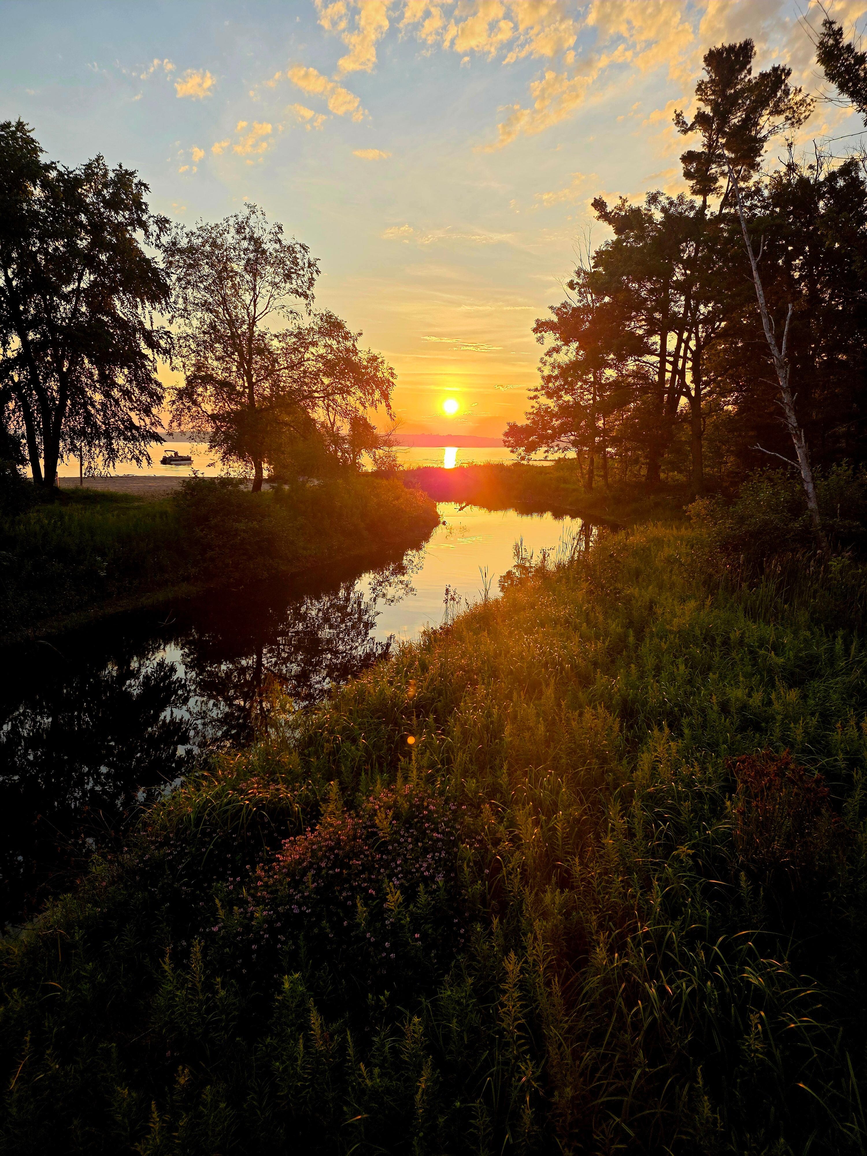 Sunset from the bridge to the beach at the condo Thursday 8/7/2025