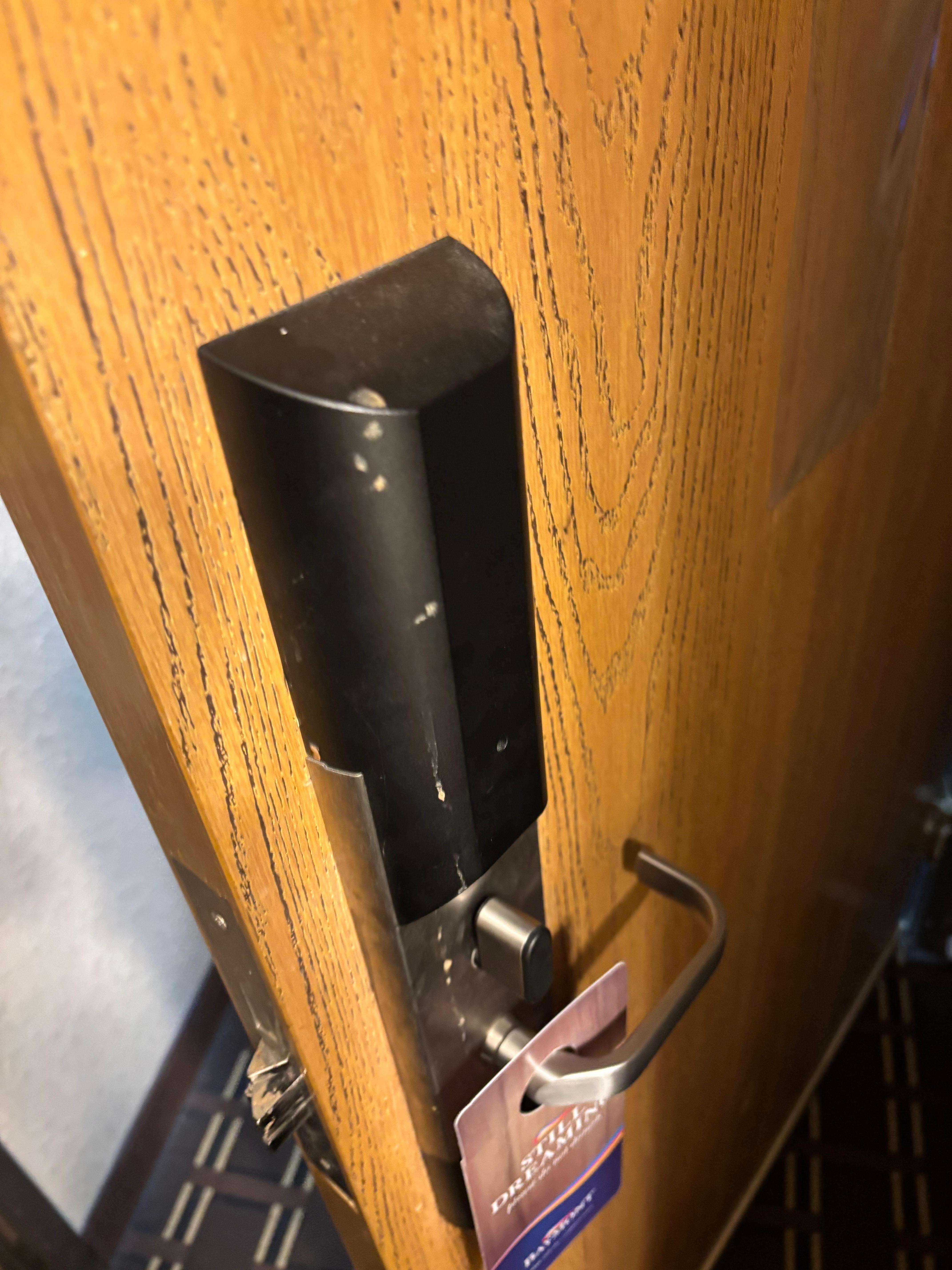 Disgusting door handle with substance dried. 