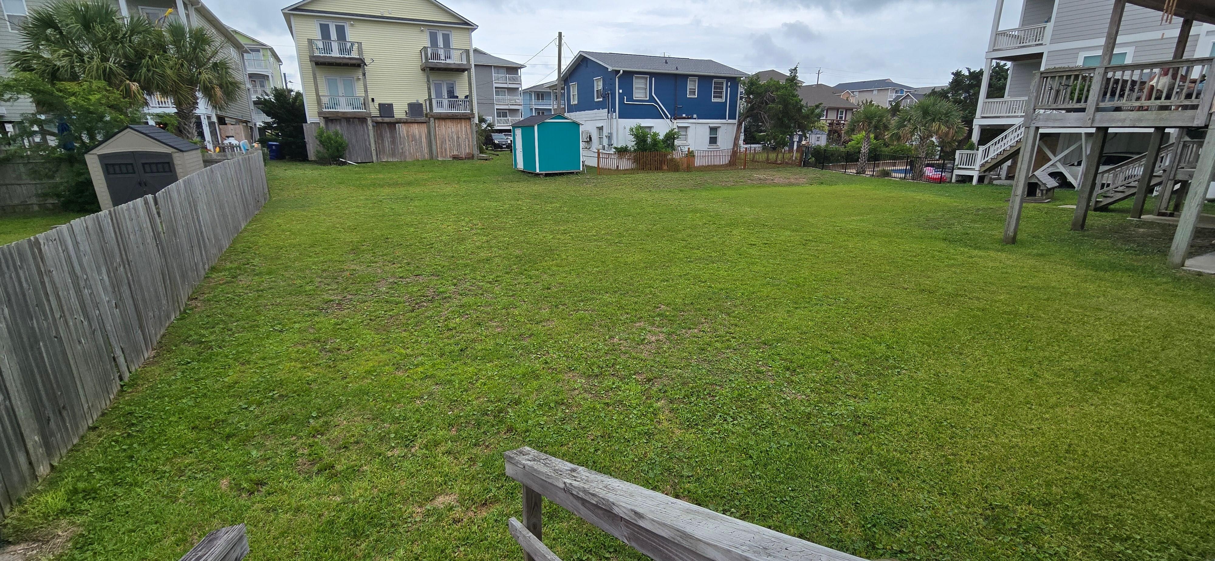 Backyard-Lots of room to play corn hole or put up a volleyball net.
