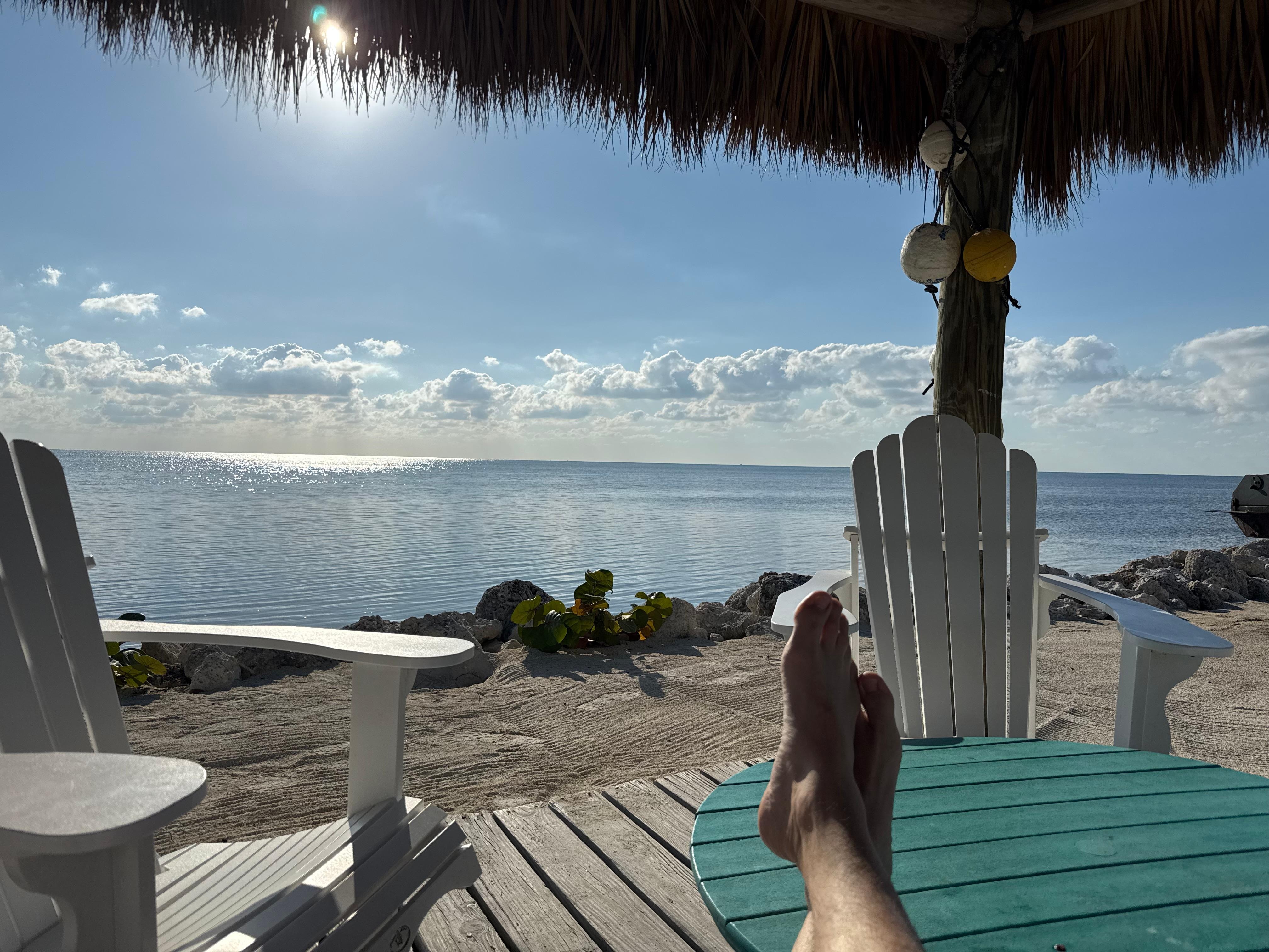Relaxing on the beach area by the marina
