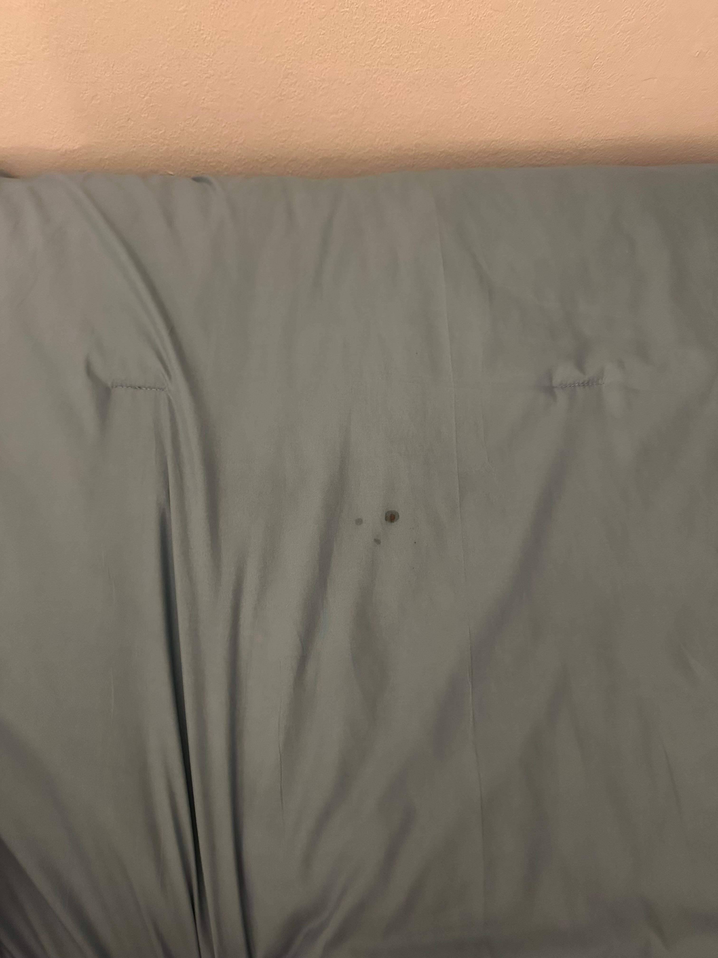Blood stained comforter.