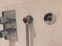 the ground floor bathroom shower does not work, and is partly broke and rusted off, I had to squat down to use the bathtub faucet to clean myself.