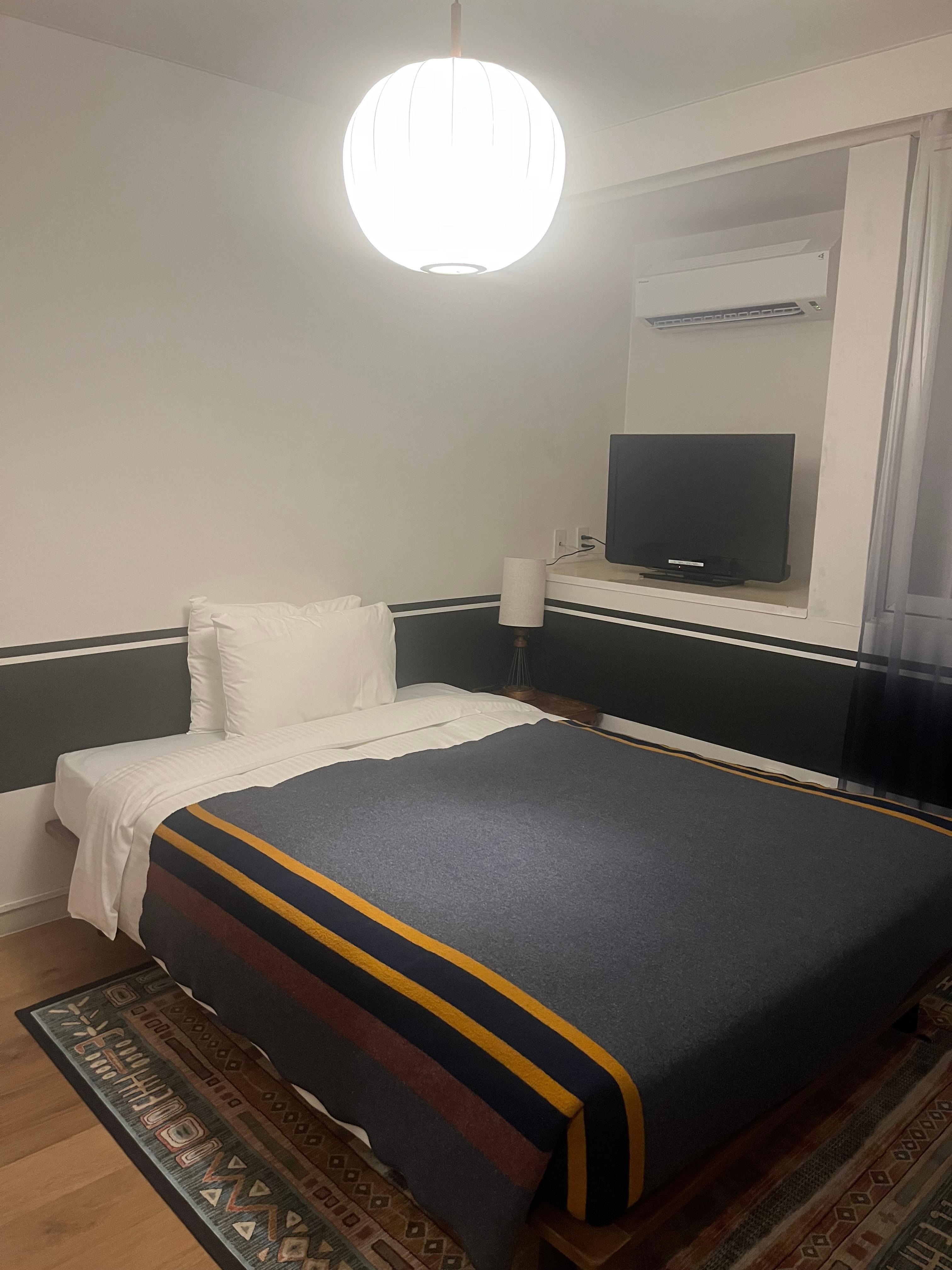 客室､シンプルですが快適なベッド