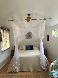 Room separated from kitchen and living area