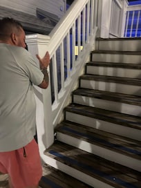 Another flight of stairs outside of 115