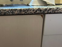 Worn out unmatching kitchen doors