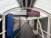 Eslkway from hotel directly into airport to Terminal 4. Just a 5 minute enclosed walk