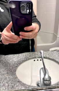Mirror has toothpaste splatter