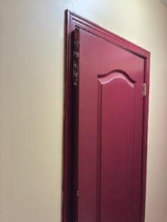 The bathroom door does not fit the frame