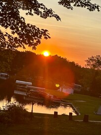 Sunset from sun porch at property.