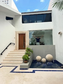 Secluded private entries to each house with parking and gated entry to the area
