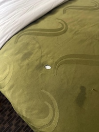 Riddled cigarette burned blankets