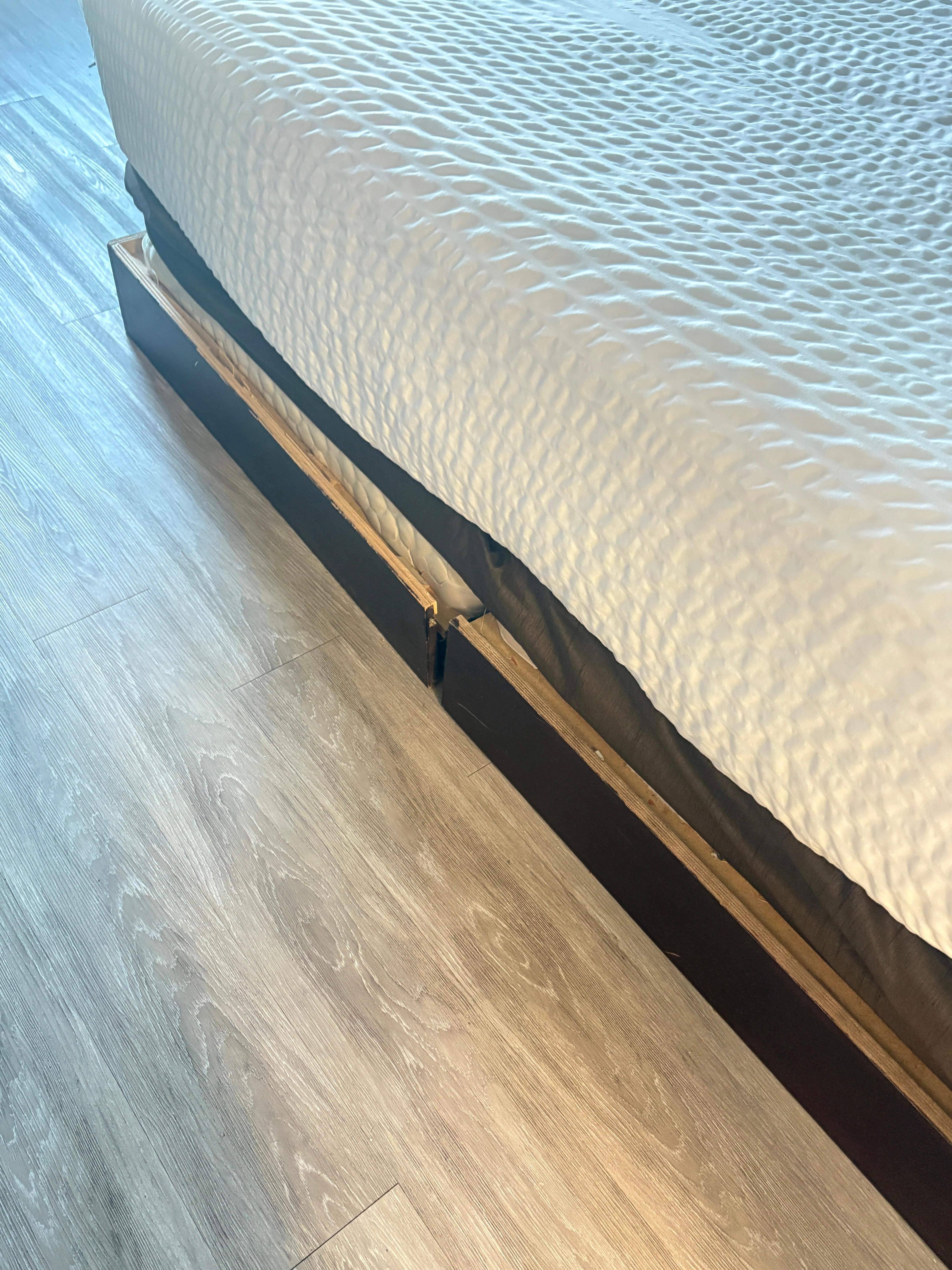 Bed was on some kind of homemade bottom.  Box springs are broken under the mattress 