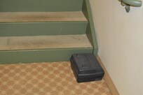 rat trap at the lower level stair well