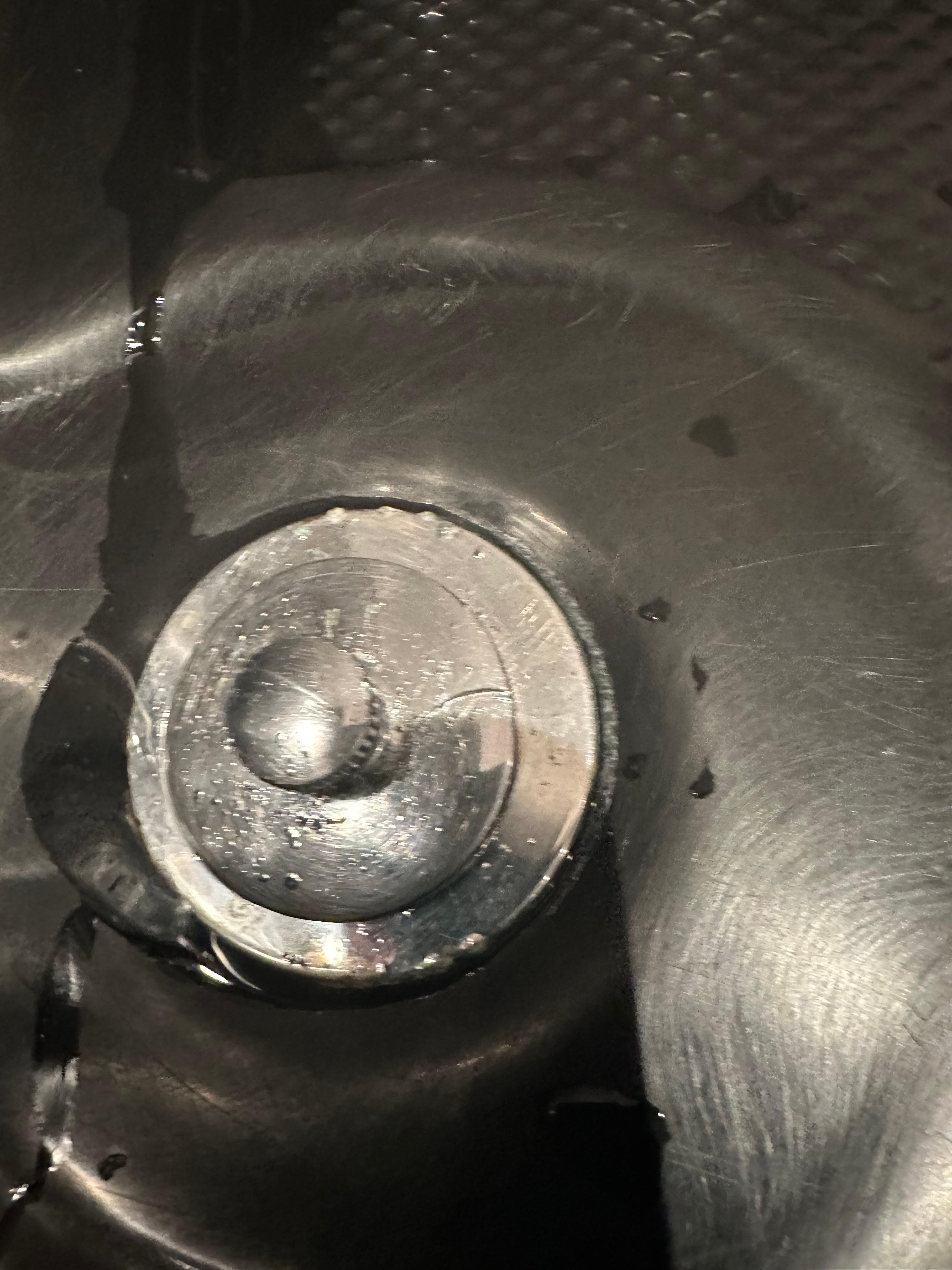 Master bathroom jacuzzi tub plunger crack