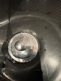 Master bathroom jacuzzi tub plunger crack