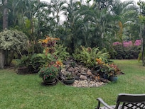 Garden area of the condo grounds - lots of chairs available