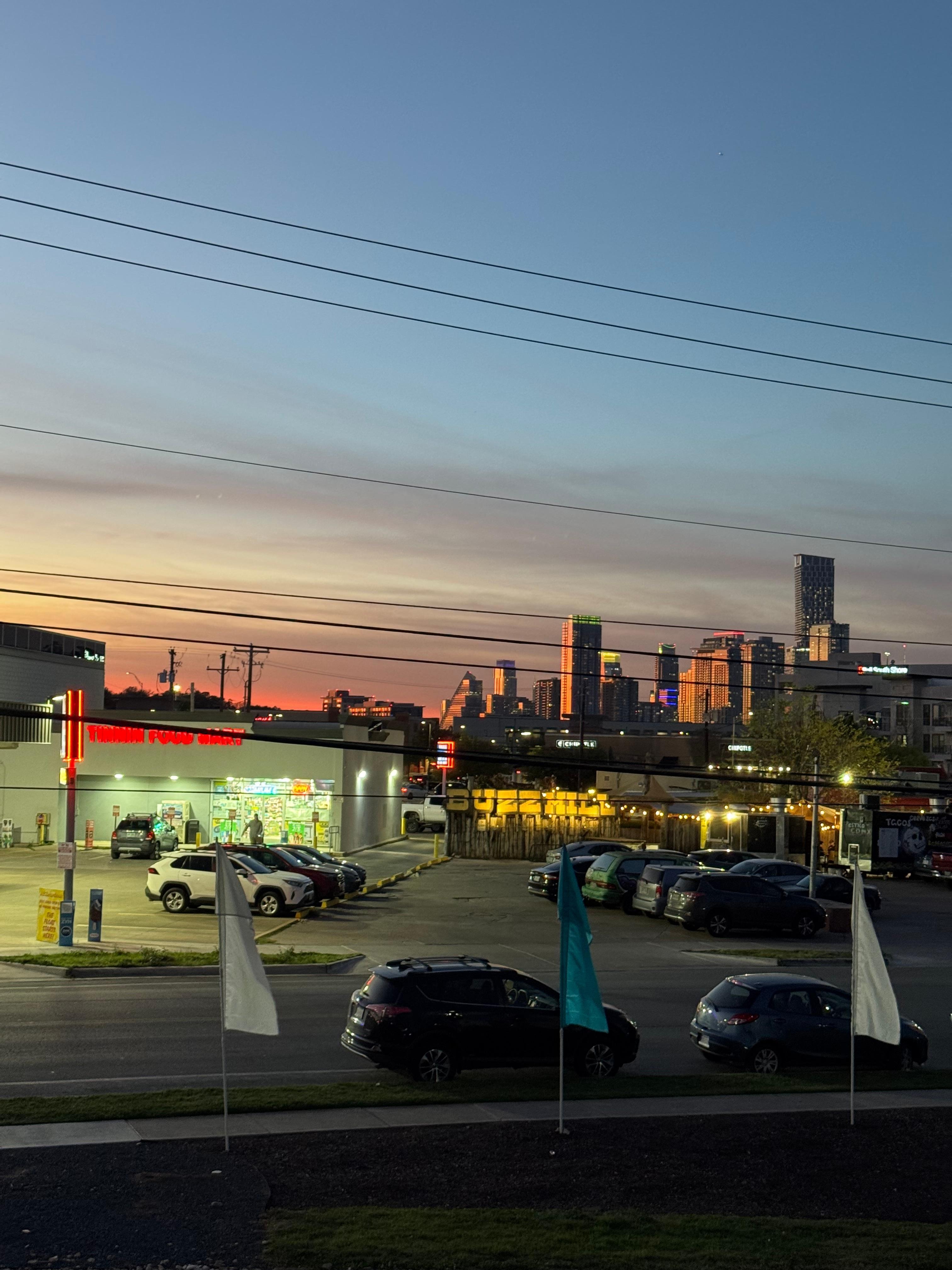 View from the front balcony over a busy road and 24 hr emergency room