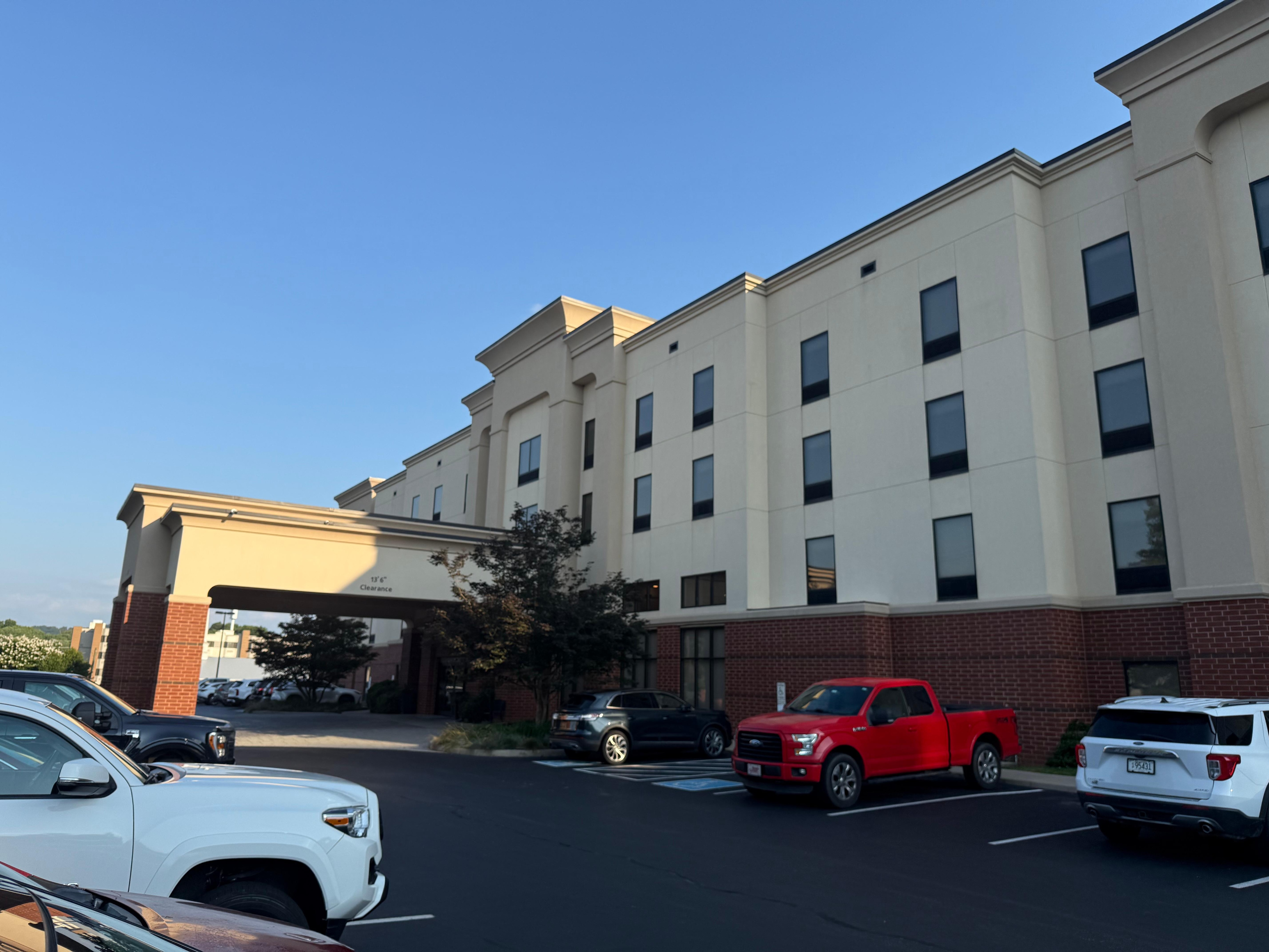 The hotel sets about 100 yards off the main road, but you can see from the road.