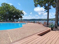 Poolside with a lake view.