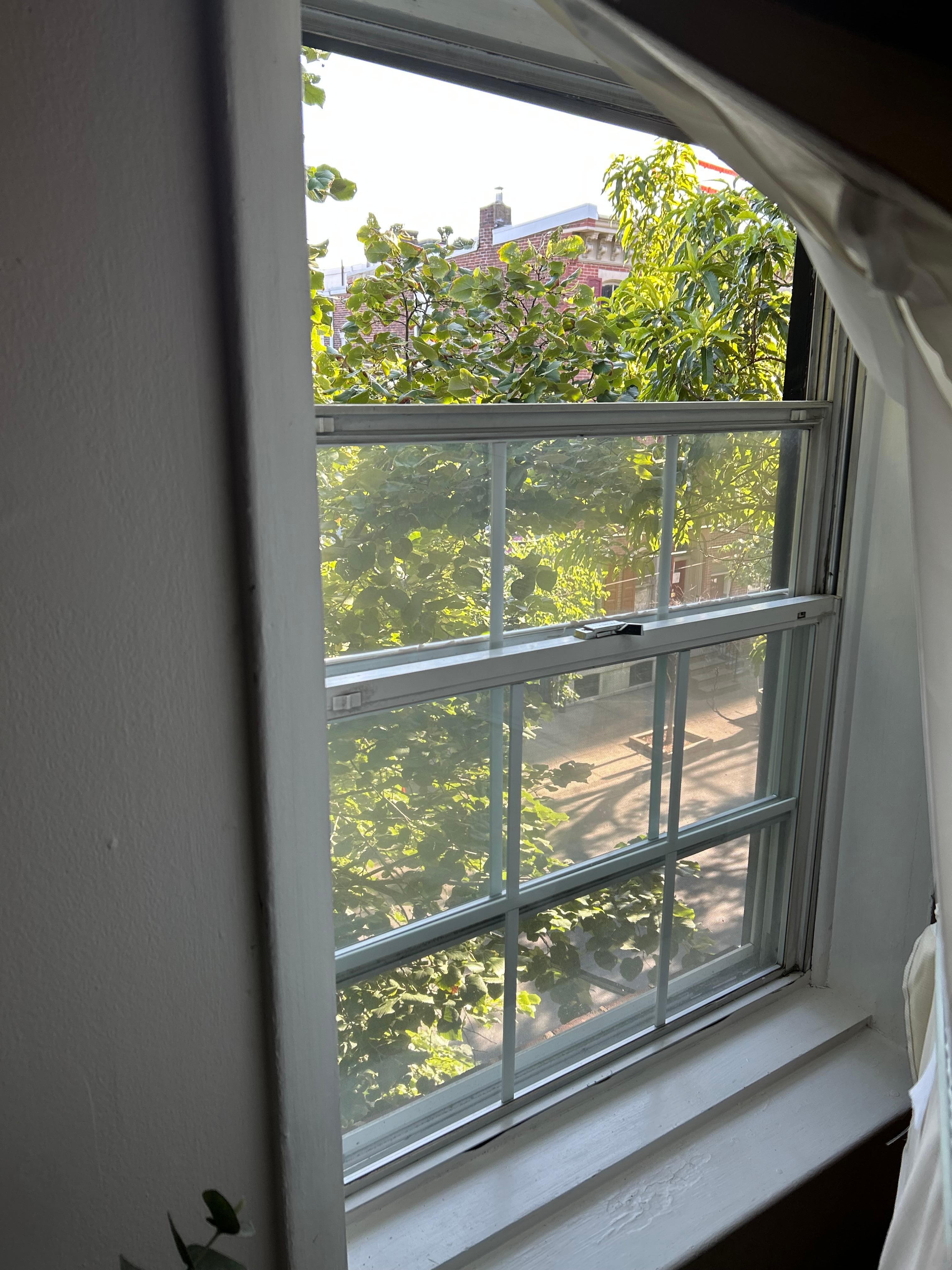 Window that had fallen open but couldn't be closed easily. Left the top floor bedroom very hot upon arrival.