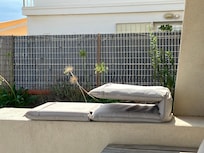 Four dirty floor cushions are The only type of ‘pool lounger’ available.