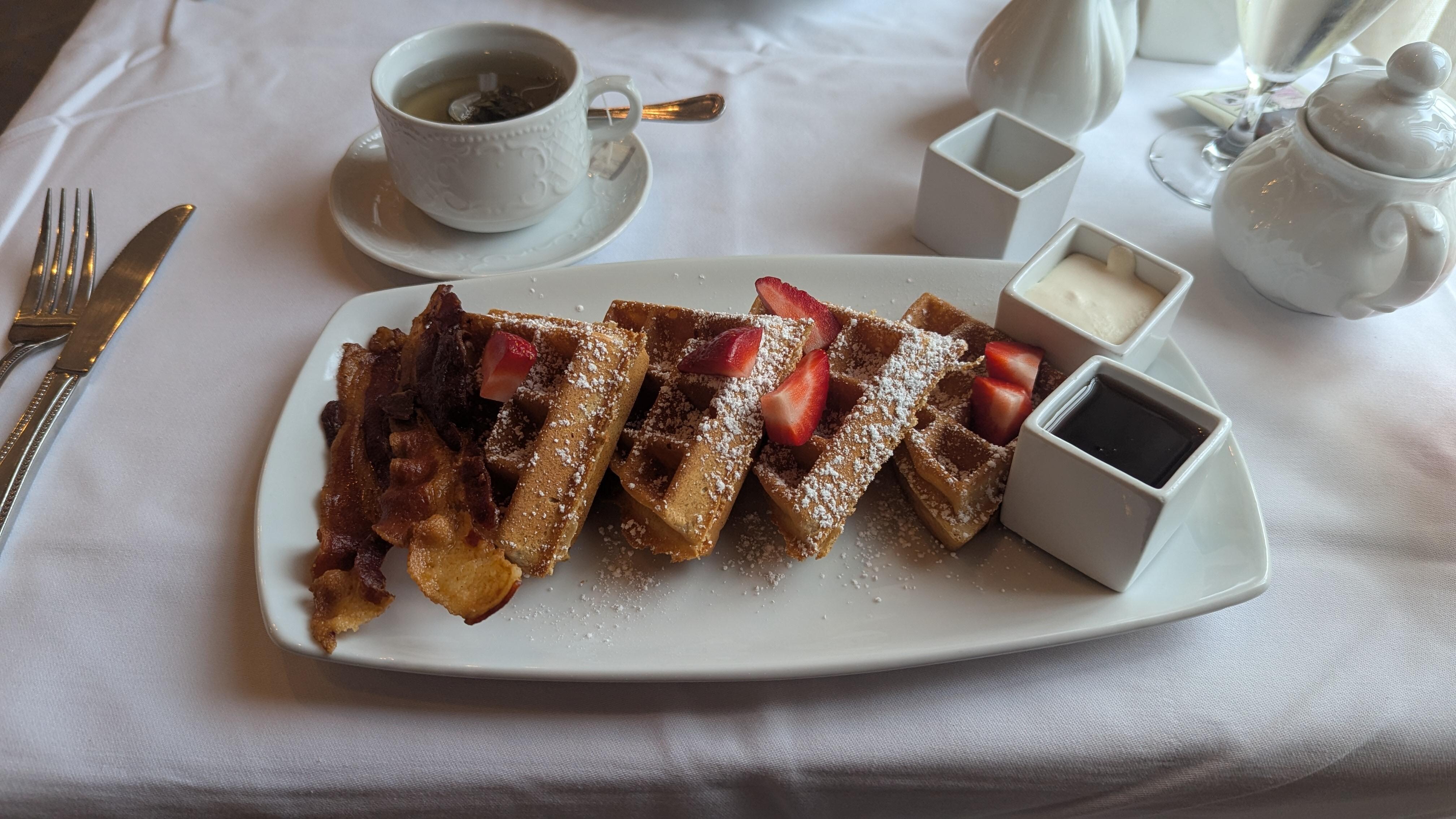 Belgium waffle with homemade whip cream and real maple syrup.
