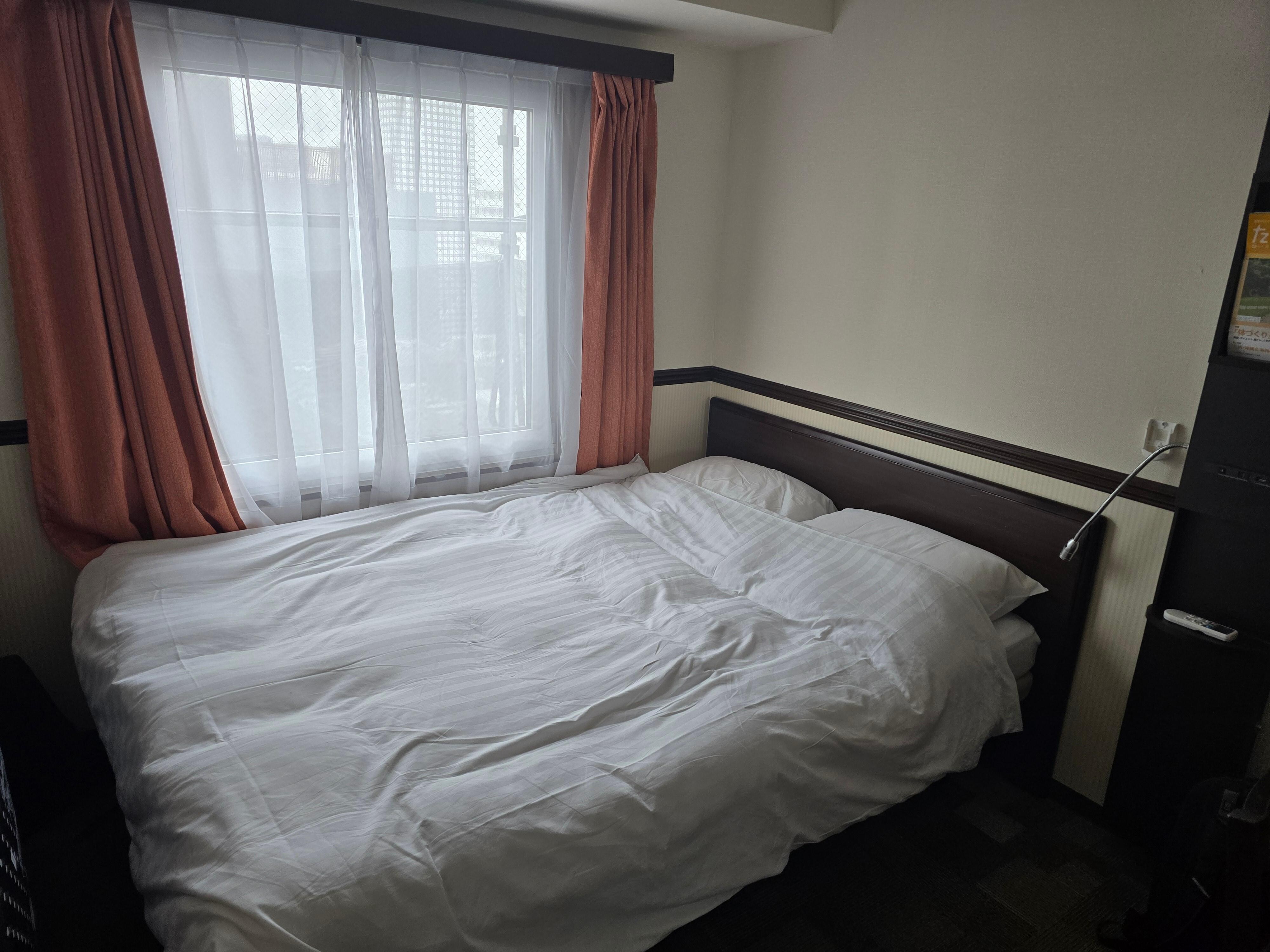 Bedroom (We unfortunately didn't take the photo when we got it, so the bed looks a little unmaid)