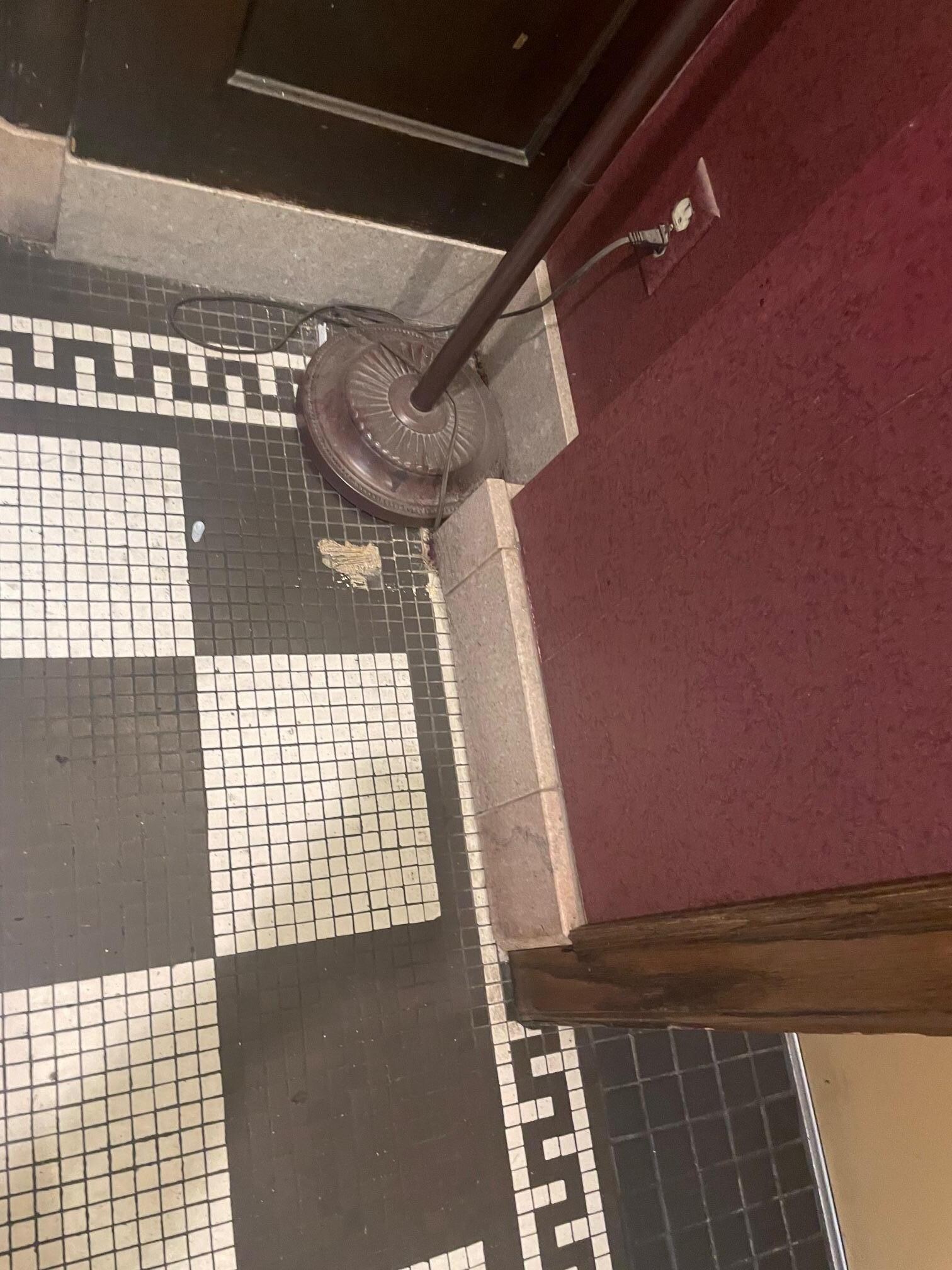 Grimy lobby tile, not sure when they were last polished