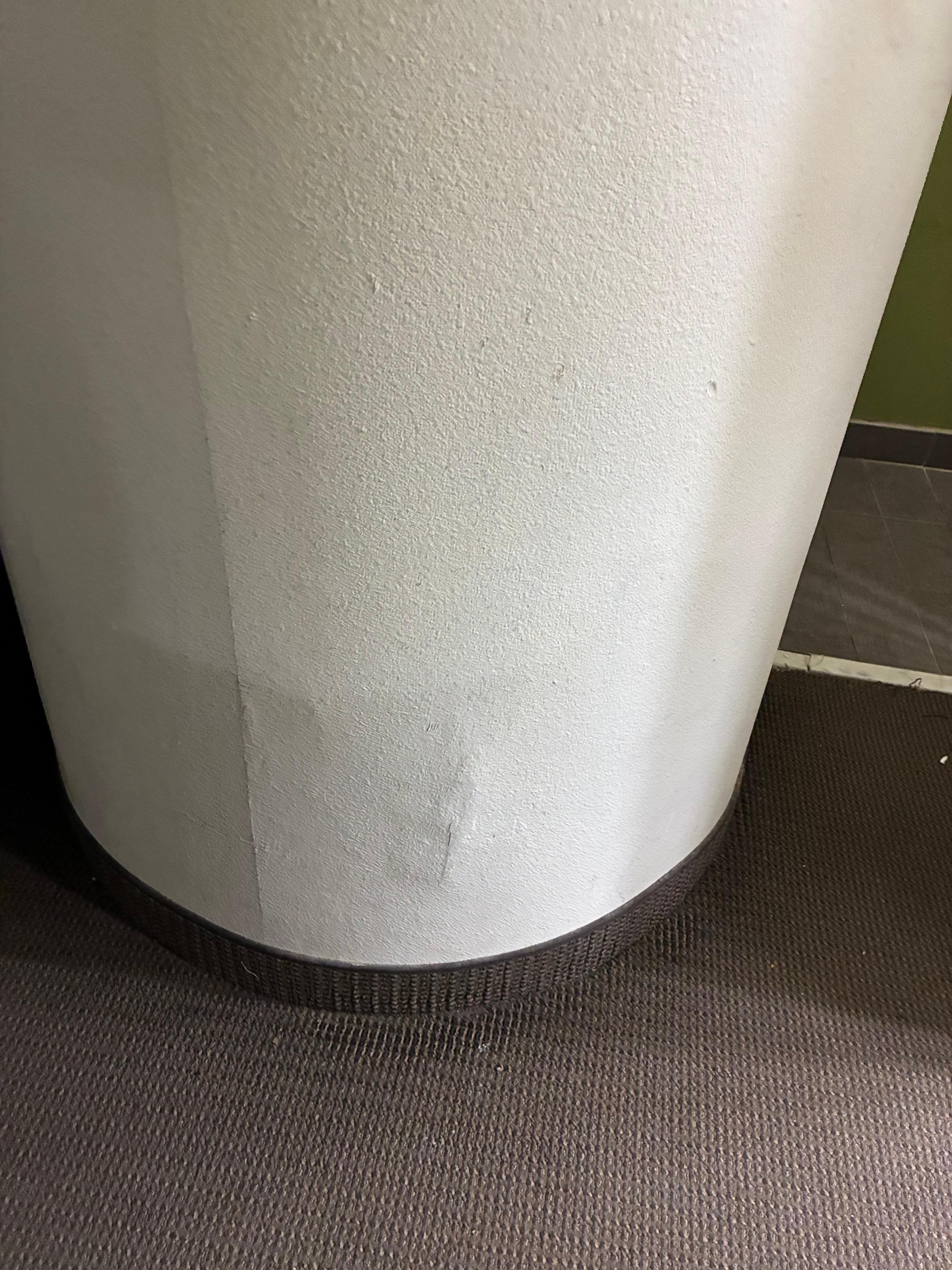 Column with water damage in the room