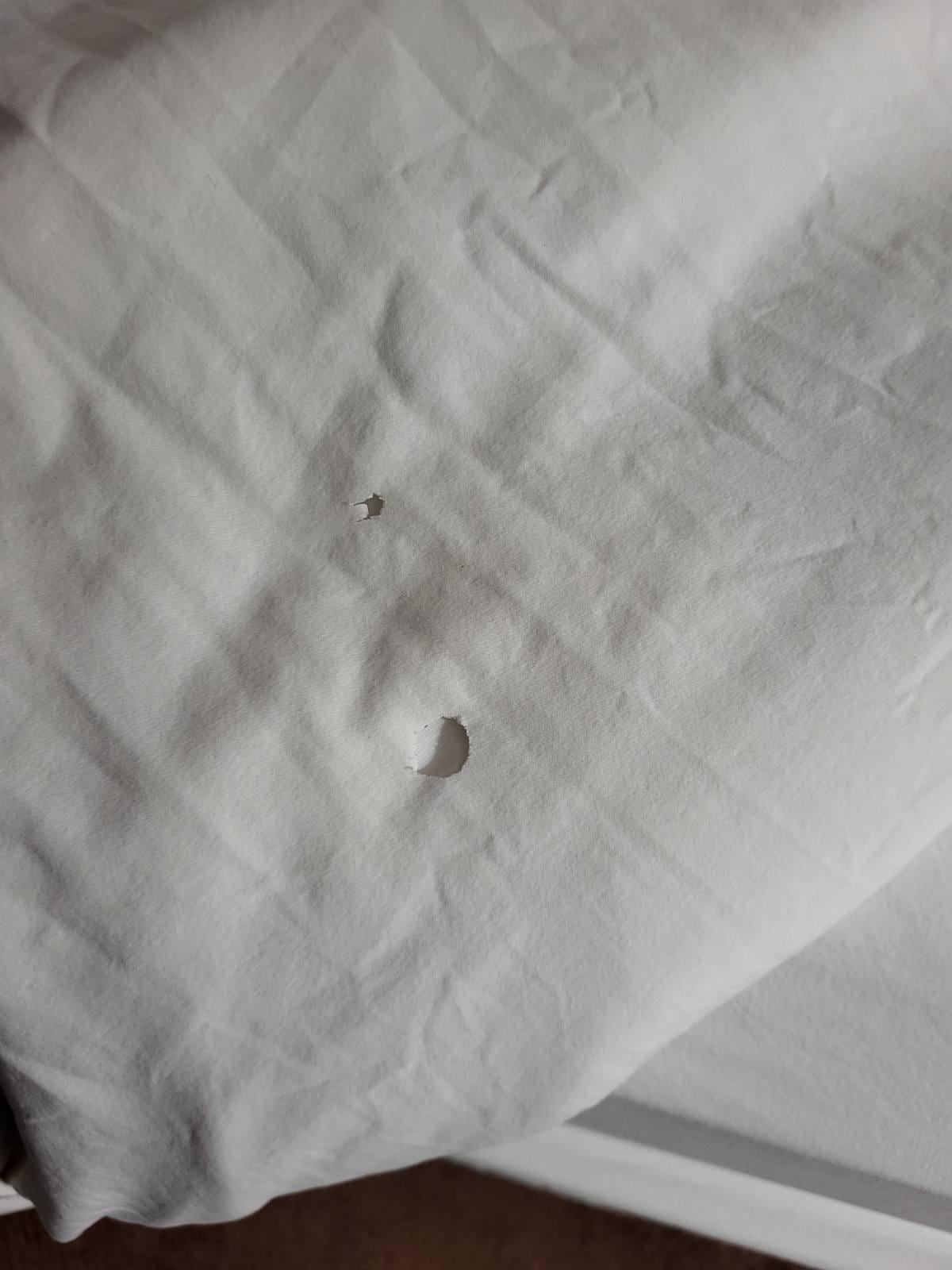 Sheets with burn holes