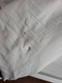 Sheets with burn holes