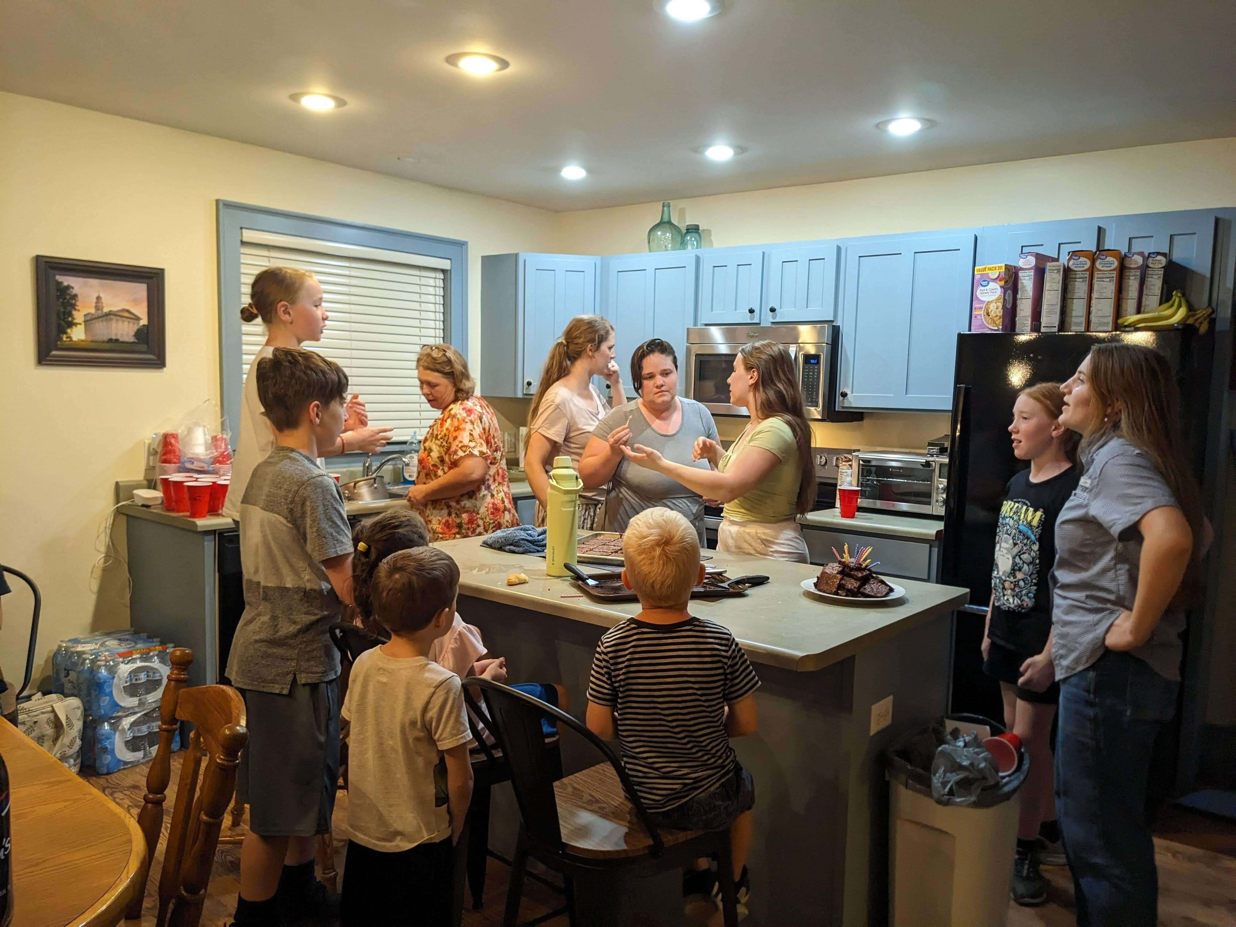 A bunch can gather in the kitchen w/o too much issue...singing Happy Birthday to the Birthday Girl.