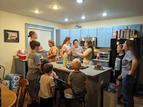 A bunch can gather in the kitchen w/o too much issue...singing Happy Birthday to the Birthday Girl.