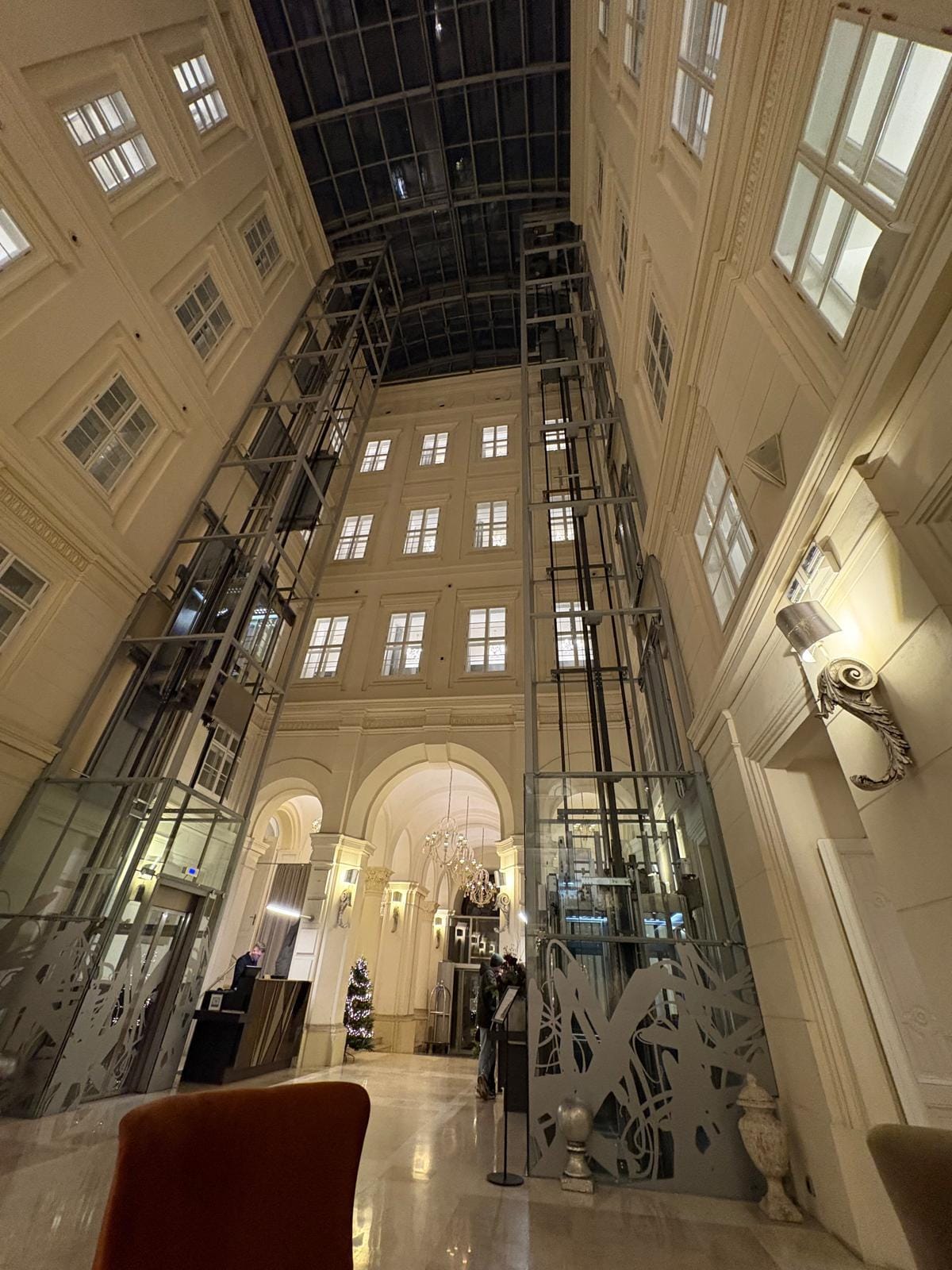 The floors are serviced by 2 glass elevators on either side and offer great views of the lobby.