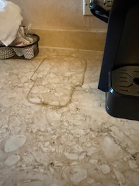 Filth under the coffee pot.