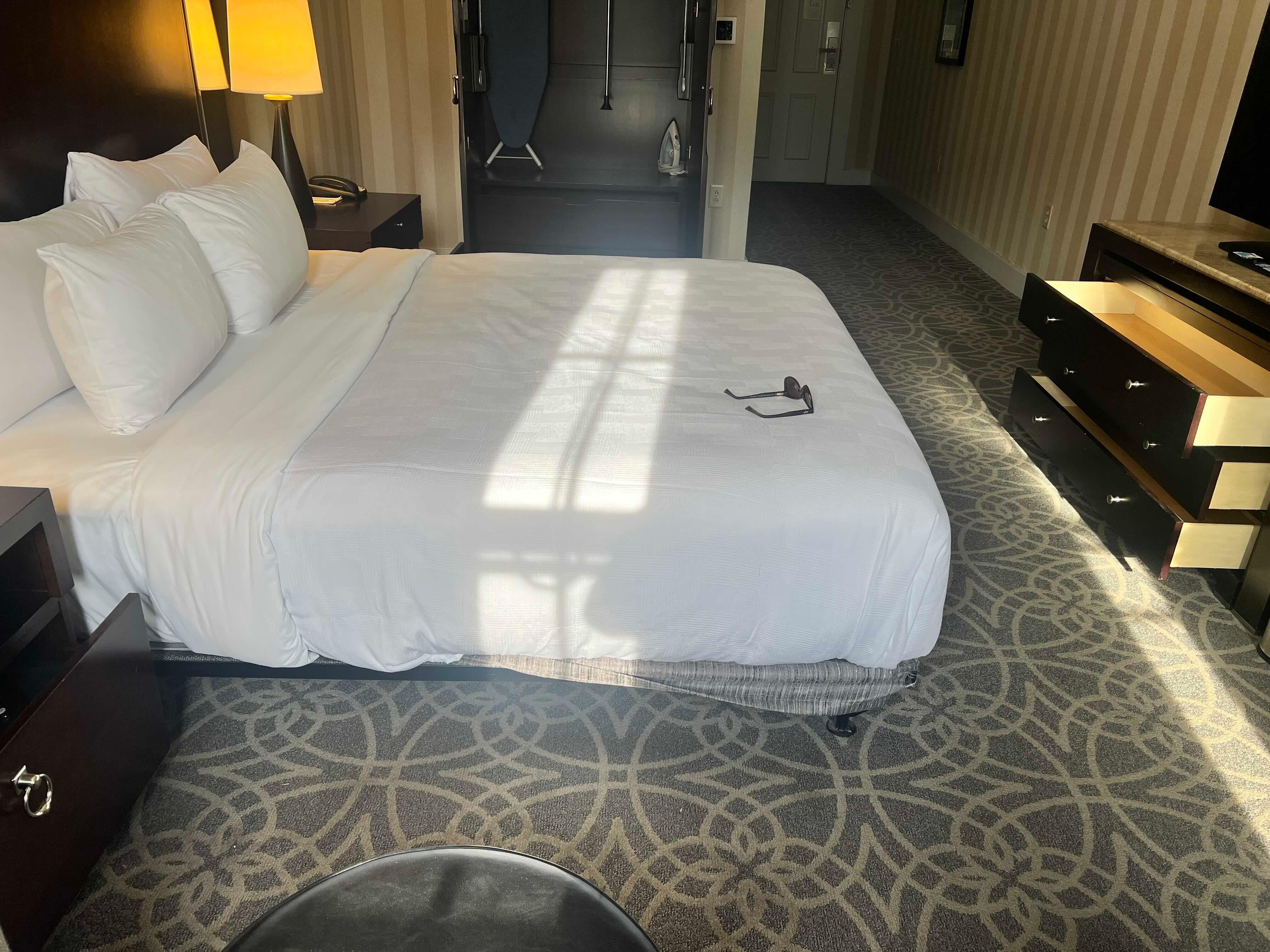 Upon entering my room, I immediately noticed all drawers were left open and the toilet seat was up—clear signs the room had not been properly serviced.