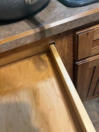 All are pictures of mouse poop in drawers