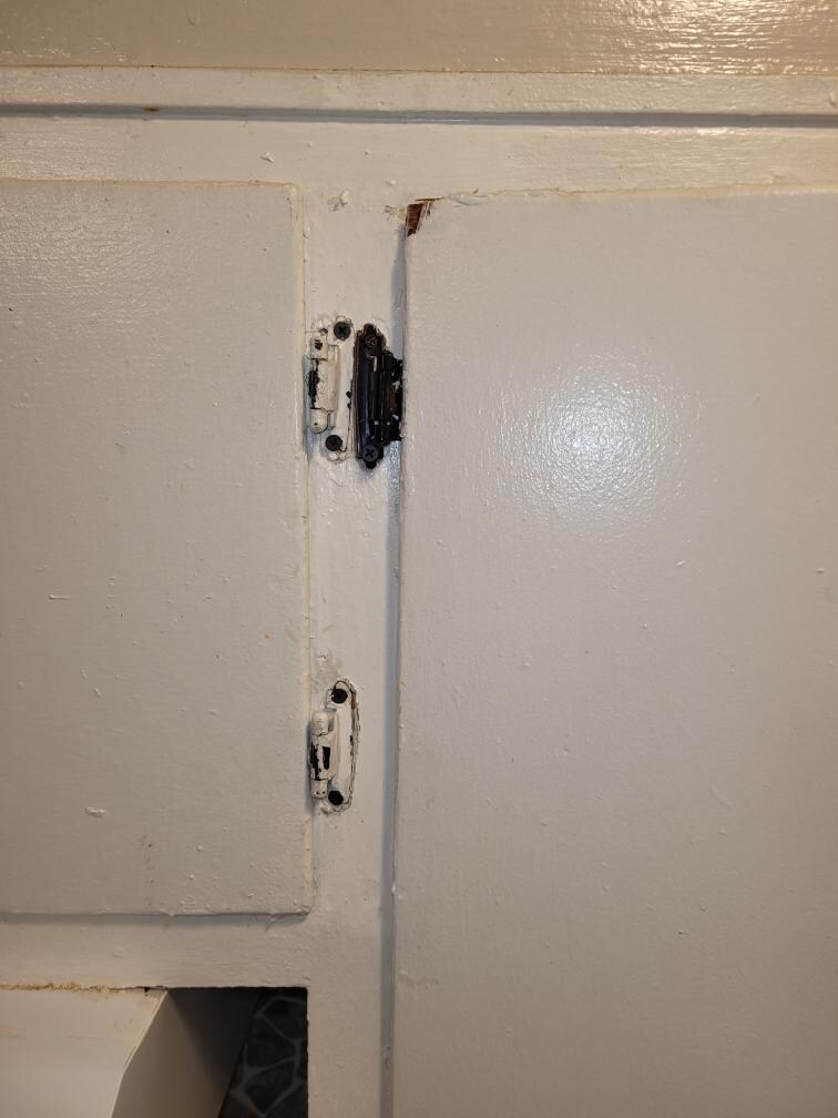 Kitchen cabinets... some don't close.