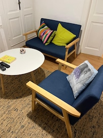 TV/ seating area. The only other indoor seating was the kitchen table.