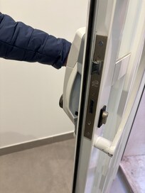 Building front door was constantly found open and didnât properly latched when closing