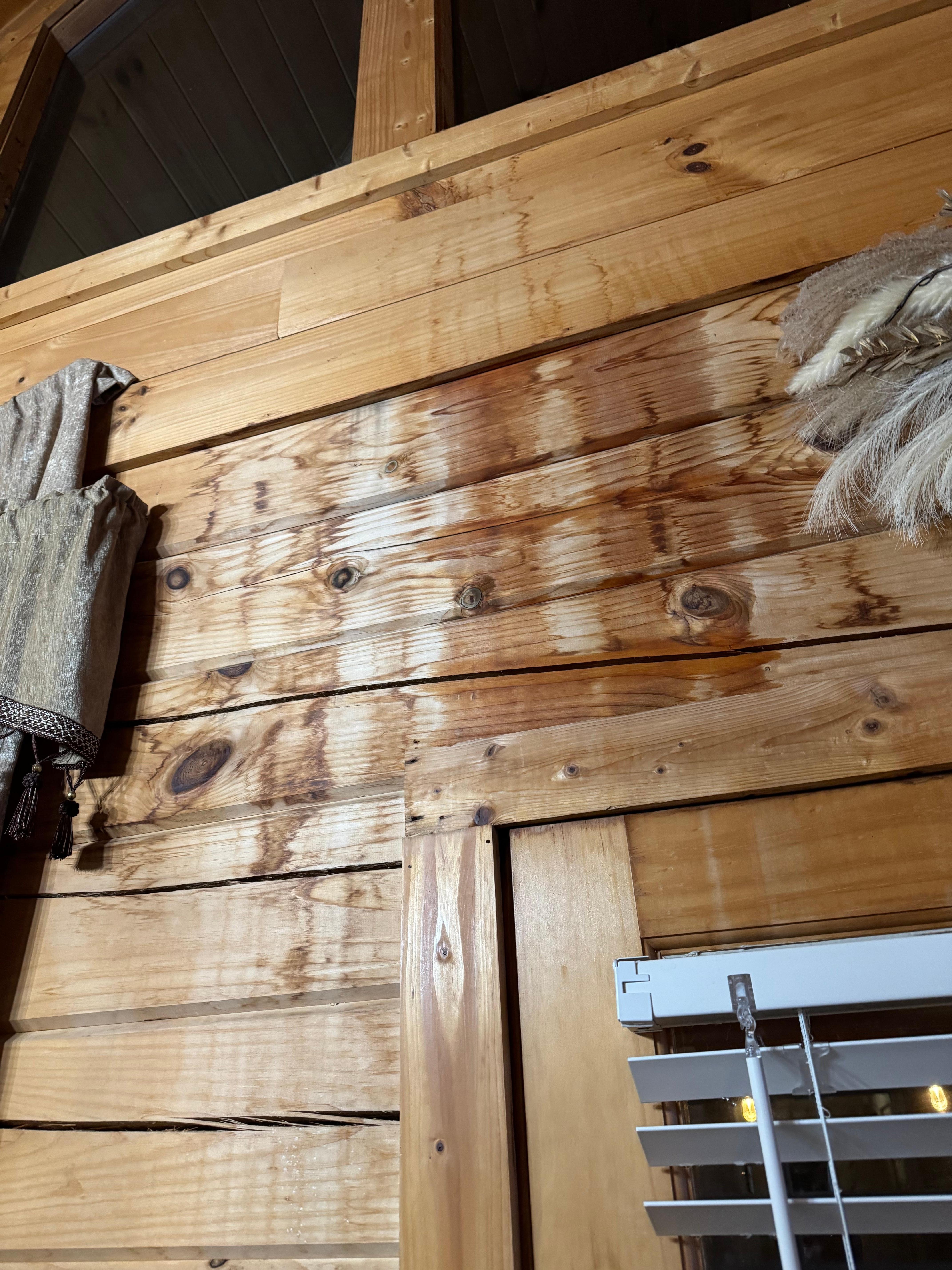 Rain coming in through roof and windows.