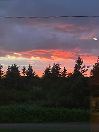 Sunset from Oyster Bay Cottage front porch.