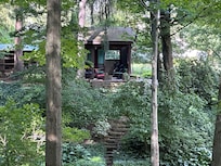 View from trails on property looking at wine shack