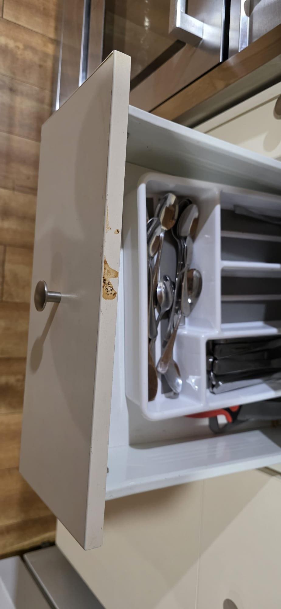 grease marks on cutlery drawer