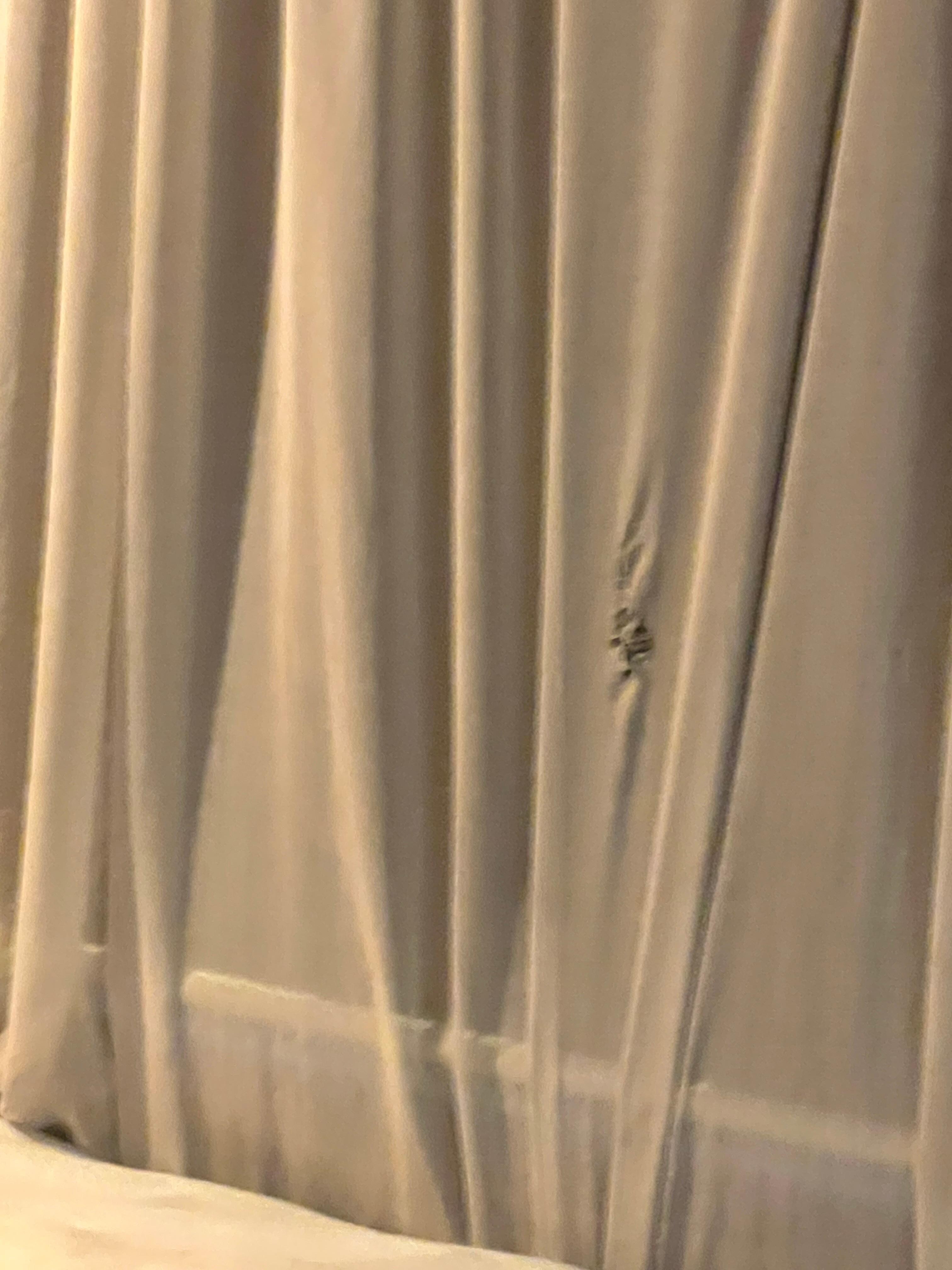 Ripped curtain