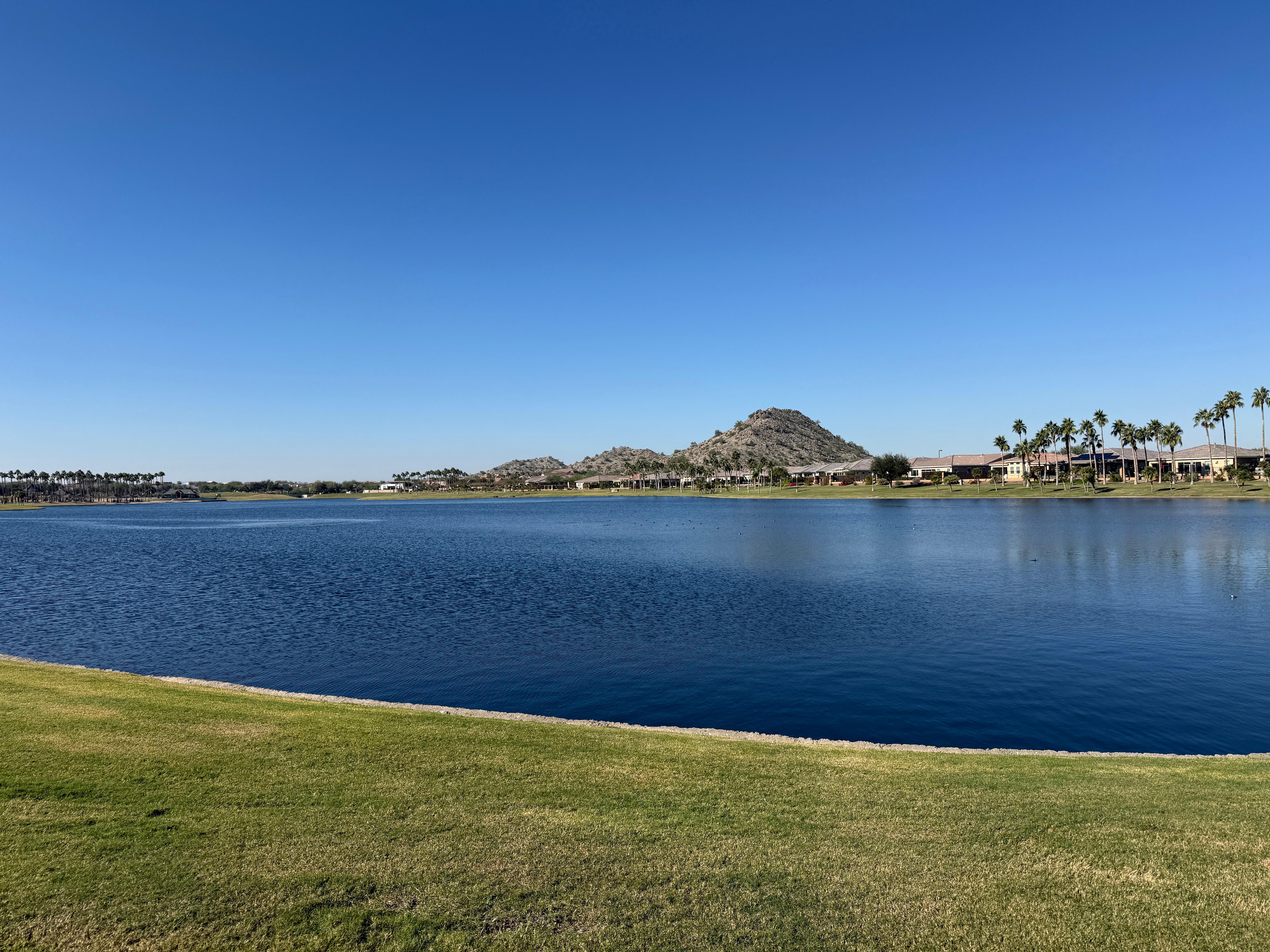Neighborhood lake which is walkable via a trail 