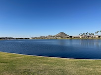 Neighborhood lake which is walkable via a trail